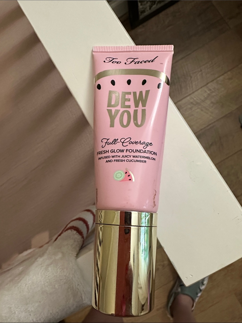 Too Faced Dew You Foundation - Pink & Gold Packaging maple in color